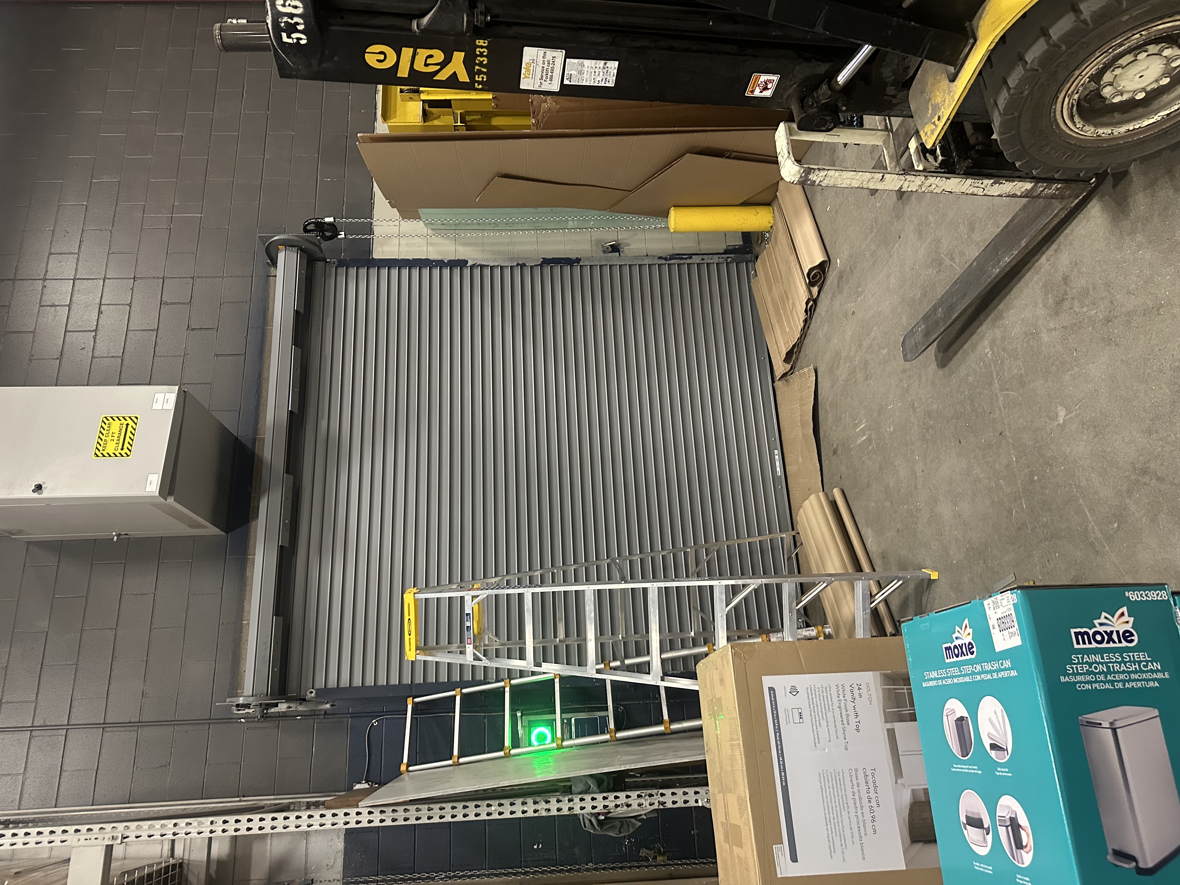Completed commercial roll-up door installation in a warehouse